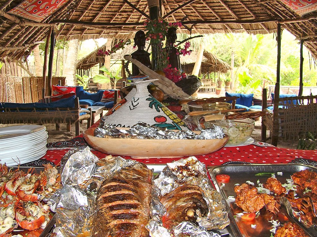 Delicious Swahili-style seafood lunch served on Funzi Island during a coastal day tour from Diani Beach