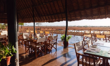 Ngutuni Safari Lodge dining area with views of surrounding wilderness