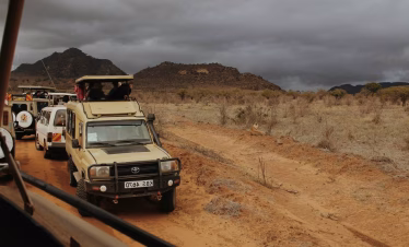 Wity Tours open-roof safari vehicle during a Tsavo East game drive from Diani Beach