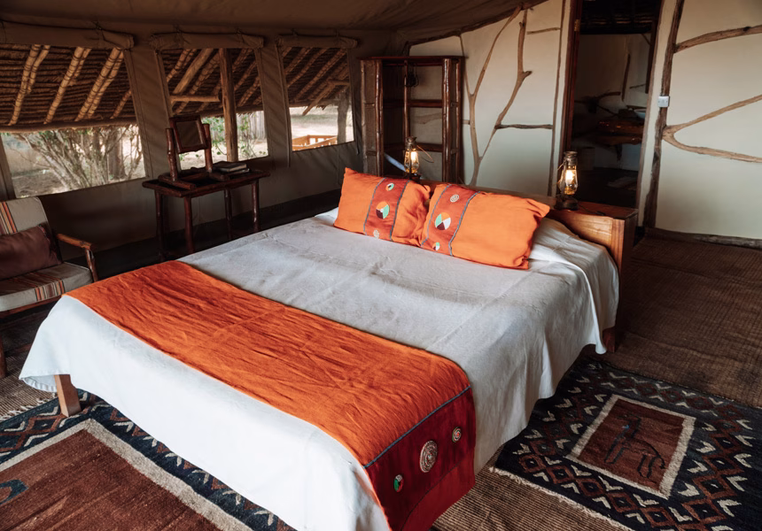 Elegant safari tent interior at Satao Camp with full-board service in Tsavo East