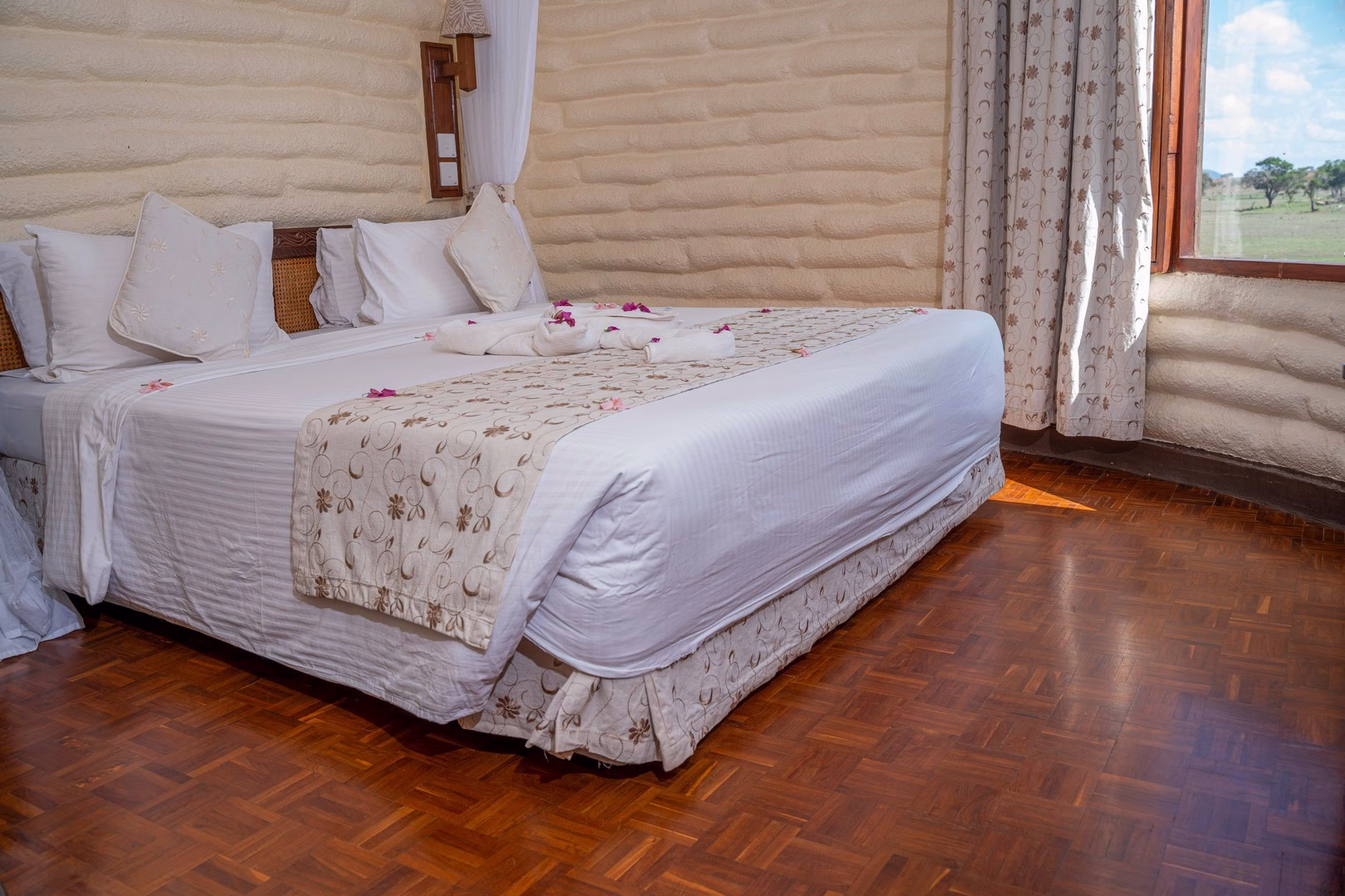Inside view of a luxury room at Salt Lick Safari Lodge with panoramic wildlife views