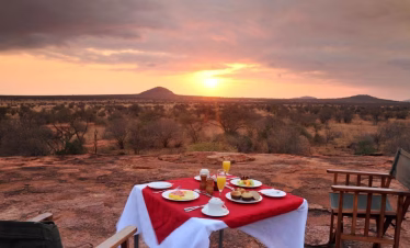 Elegant dining area at Kilaguni Serena Lodge on a Diani Beach safari tour