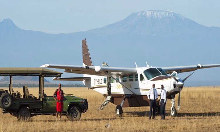 Tourists boarding a flight from Diani Beach to Amboseli for a luxury flying safari
