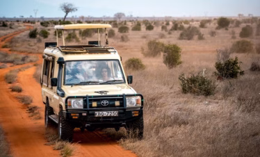 Family enjoying a Kenya safari experience from Diani Beach through Tsavo and Amboseli